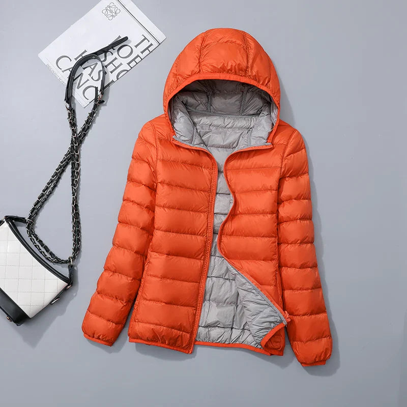 Lisa – Wende-Daunenjacke für Damen mit Kapuze