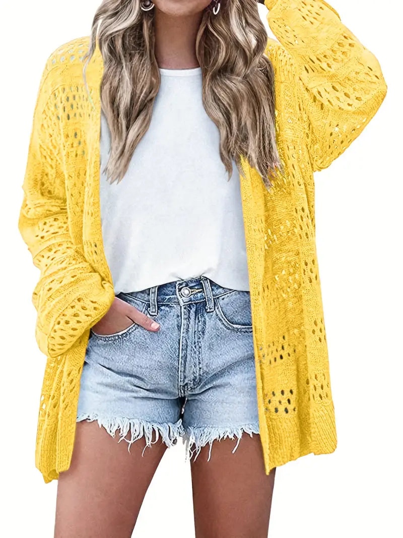 Alma – Gestrickte Strickjacke mit langen Ärmeln und Cut-out-Design